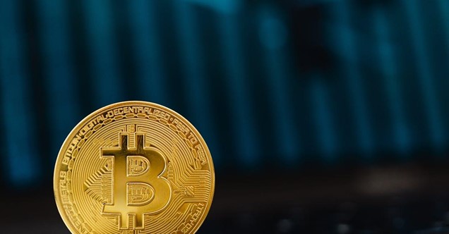 Bitcoin Coin Image with blurry computer screen